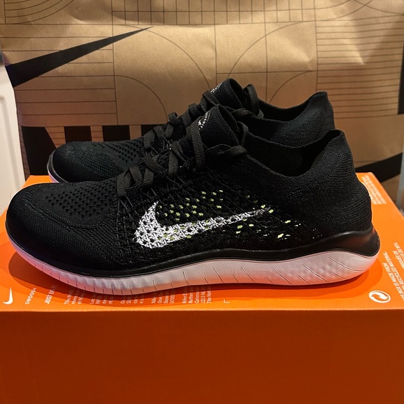 Nike Shoes - Nike Free Run Flyknit 2018 - Black and white - Size 7.5 women’s